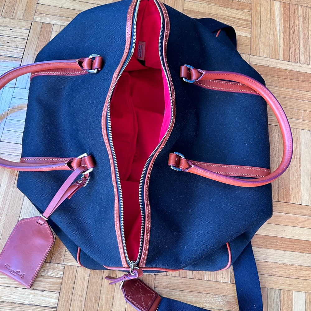 Excellent condition Dooney& Bourke travel bag .